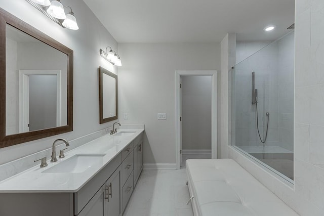 1459 Bennett Creek Ovlk, Suwanee, GA 30024 - bathroom featuring double vanity, tiled shower, tile patterned flooring, and recessed lighting