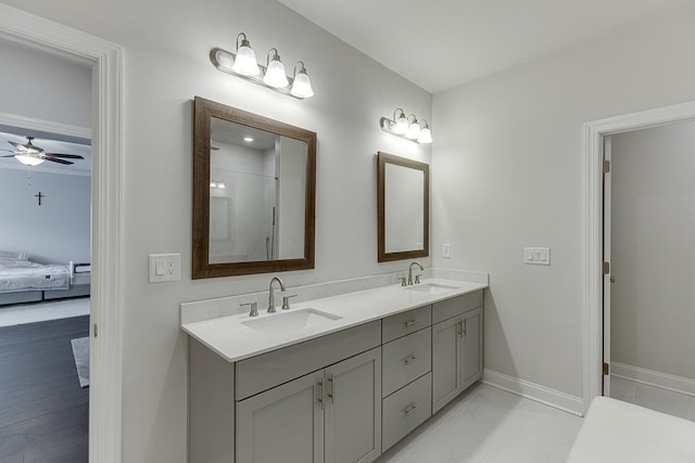 1459 Bennett Creek Ovlk, Suwanee, GA 30024 - ensuite bathroom featuring double vanity and ceiling fan