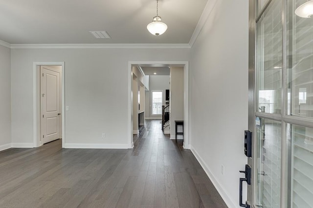 1459 Bennett Creek Ovlk, Suwanee, GA 30024 - entryway with dark wood-style flooring and ornamental molding