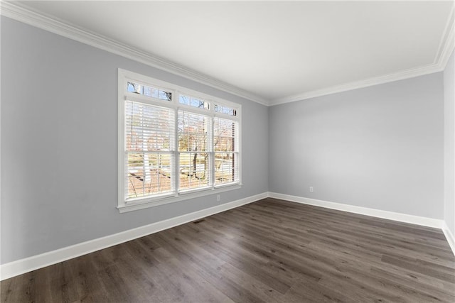 unfurnished room featuring crown molding, baseboards, and a wealth of natural light