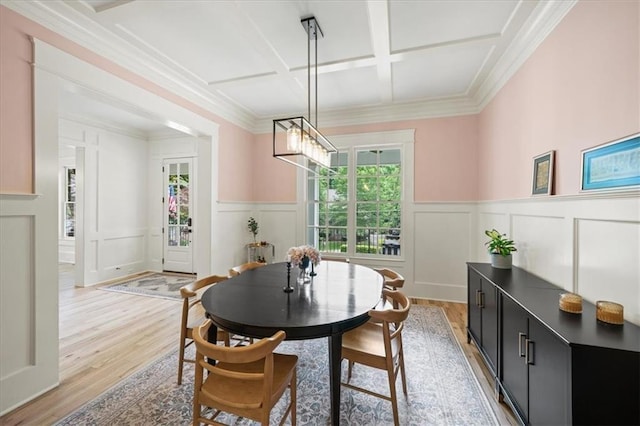 4048 Navajo Trl, Brookhaven, GA 30319 - dining area featuring coffered ceiling, light wood-type flooring, wainscoting, a decorative wall, and beamed ceiling