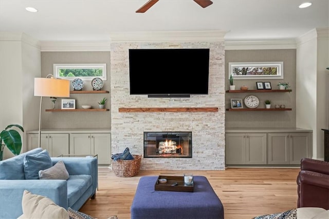 4048 Navajo Trl, Brookhaven, GA 30319 - living area featuring ceiling fan, light wood-type flooring, a fireplace, crown molding, and recessed lighting