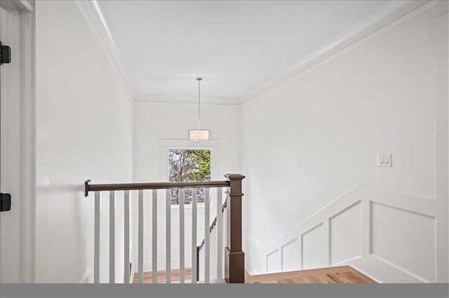 4048 Navajo Trl, Brookhaven, GA 30319 - stairs with crown molding, a decorative wall, and a wainscoted wall
