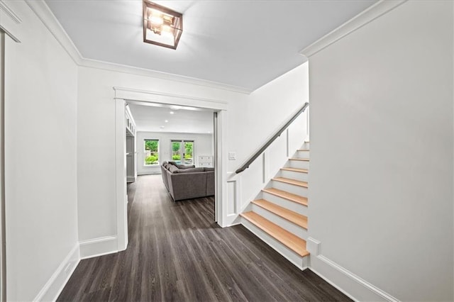 4048 Navajo Trl, Brookhaven, GA 30319 - corridor with dark wood-style floors, stairway, ornamental molding, and baseboards