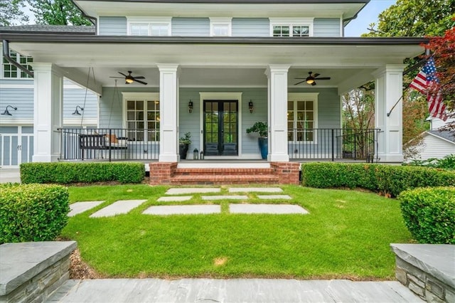 4048 Navajo Trl, Brookhaven, GA 30319 - property entrance featuring ceiling fan, a yard, and covered porch