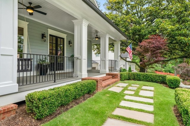 4048 Navajo Trl, Brookhaven, GA 30319 - view of green lawn with a ceiling fan and covered porch