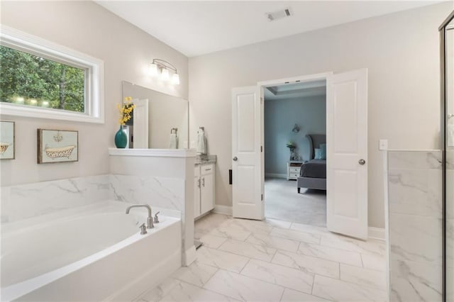 ensuite bathroom with visible vents, baseboards, ensuite bath, marble finish floor, and a bath