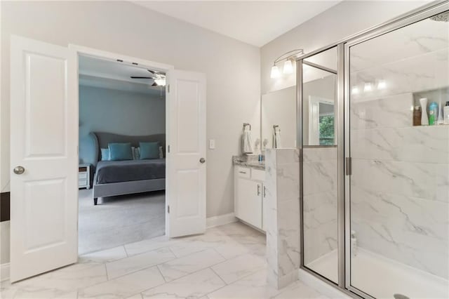 full bathroom featuring marble finish floor, a marble finish shower, ceiling fan, vanity, and ensuite bath