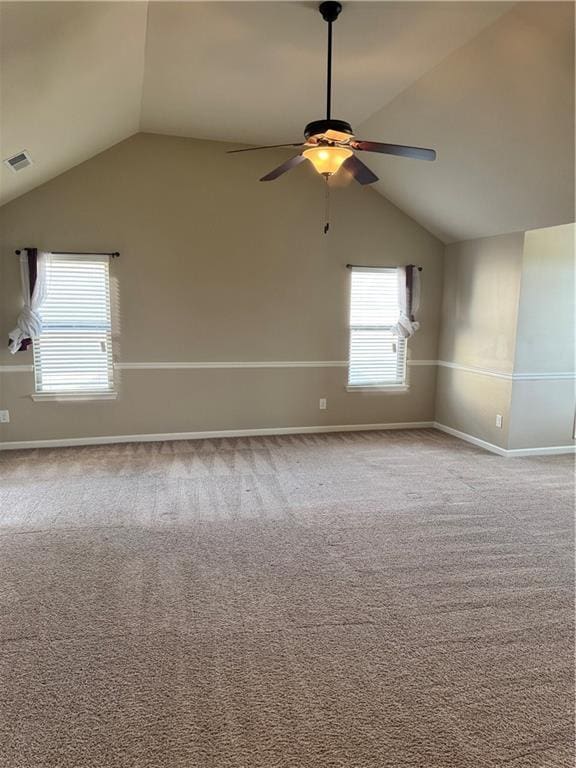 3897 Valley Bluff Ln, Snellville, GA 30039 - carpeted empty room with lofted ceiling, a ceiling fan, and baseboards