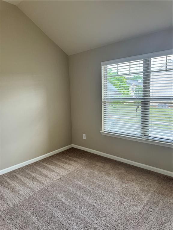3897 Valley Bluff Ln, Snellville, GA 30039 - carpeted empty room featuring baseboards and lofted ceiling
