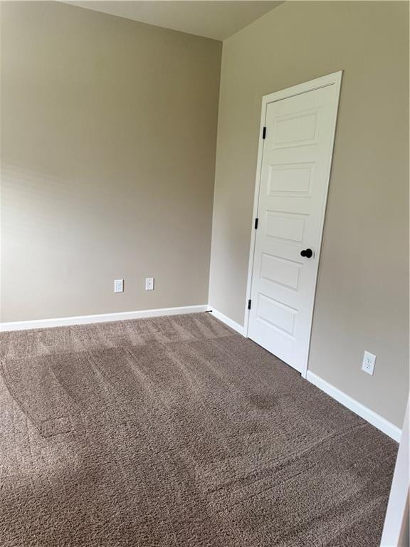 3897 Valley Bluff Ln, Snellville, GA 30039 - empty room with carpet floors and baseboards