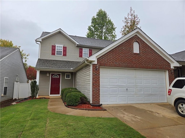 view of front property featuring a garage and a front lawn