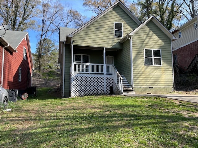 view of front of home with a front lawn and covered porch