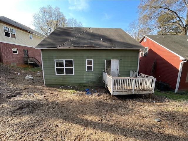 back of property featuring a deck