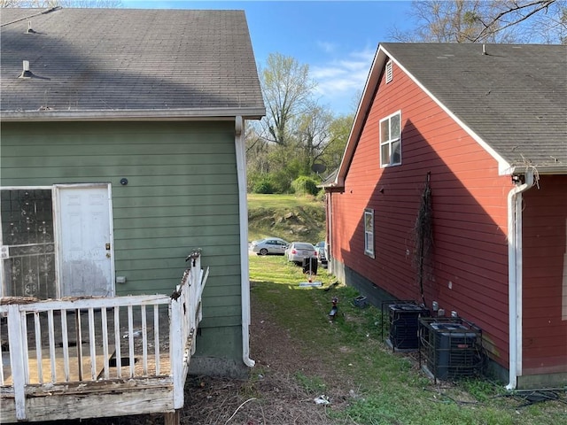 view of property exterior featuring central AC