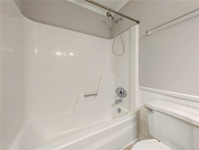 879 Rock Oak Ln, Lawrenceville, GA 30046 - full bathroom with toilet, bathtub / shower combination, and wainscoting