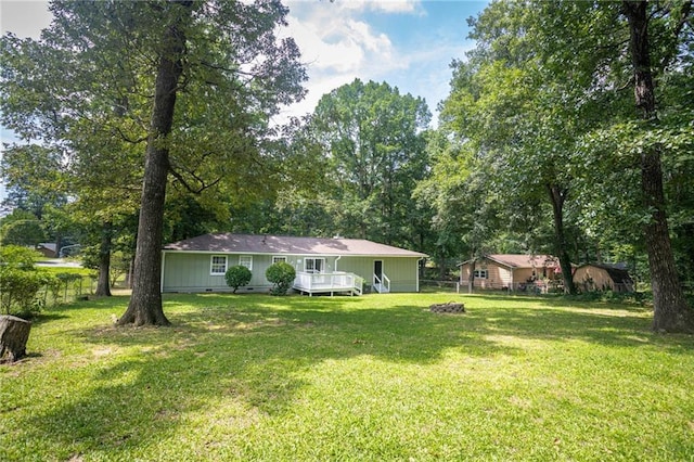 879 Rock Oak Ln, Lawrenceville, GA 30046 - view of yard with a wooden deck