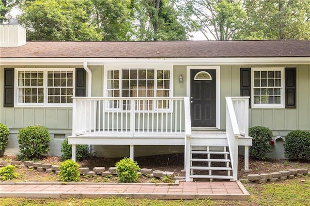 879 Rock Oak Ln, Lawrenceville, GA 30046 - ranch-style house with covered porch, board and batten siding, and a shingled roof
