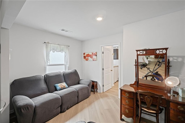 home office with visible vents and light wood finished floors