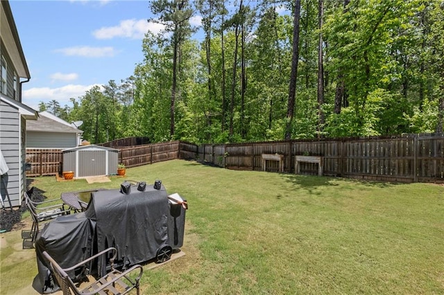 view of yard featuring an outdoor structure, a fenced backyard, central air condition unit, and a storage unit
