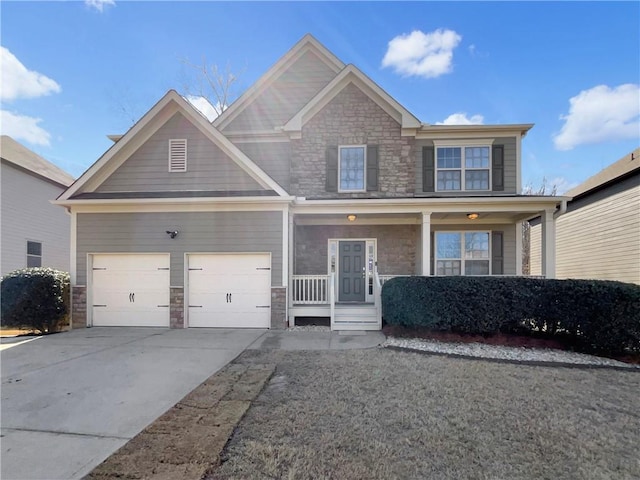 craftsman-style house with a garage, stone siding, a porch, and concrete driveway