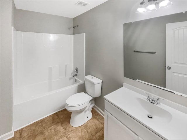 bathroom featuring toilet, vanity, visible vents, baseboards, and  shower combination