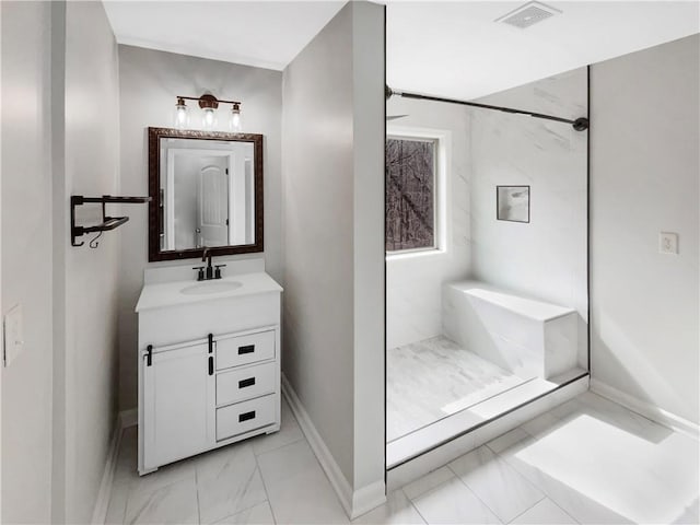 full bath with a stall shower, marble finish floor, visible vents, and vanity