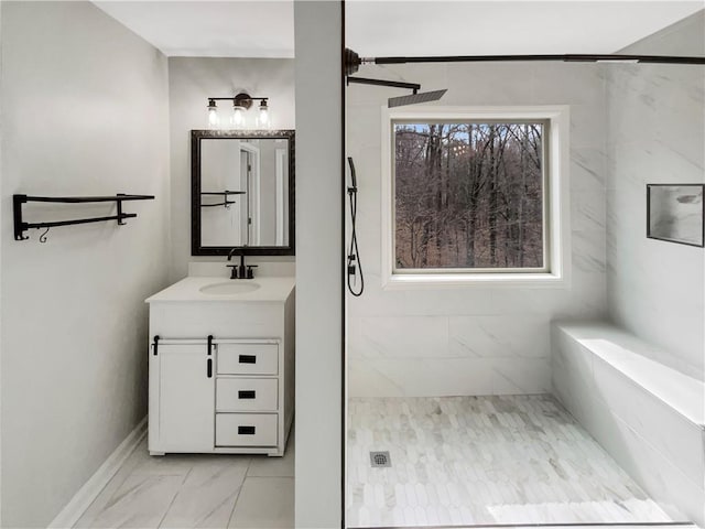 full bathroom featuring a stall shower, marble finish floor, and vanity