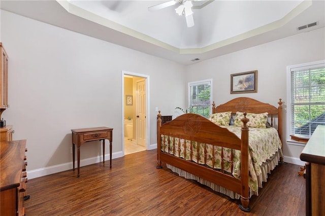 2905 Ivey Ridge Ln, Roswell, GA 30076 - bedroom with a raised ceiling, wood finished floors, a ceiling fan, and ensuite bath