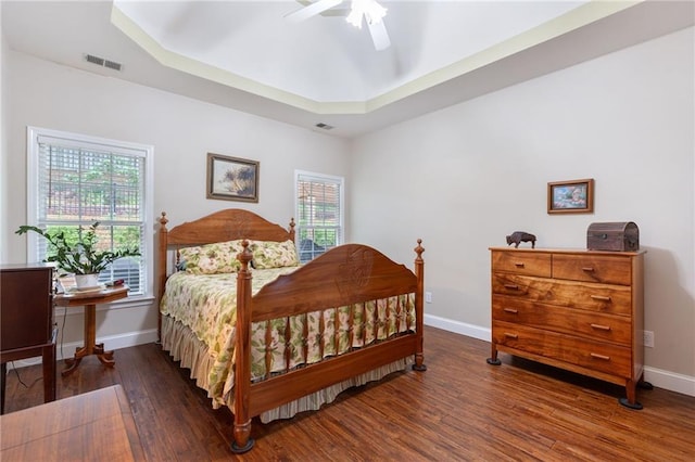 2905 Ivey Ridge Ln, Roswell, GA 30076 - bedroom with wood finished floors, a tray ceiling, and a ceiling fan