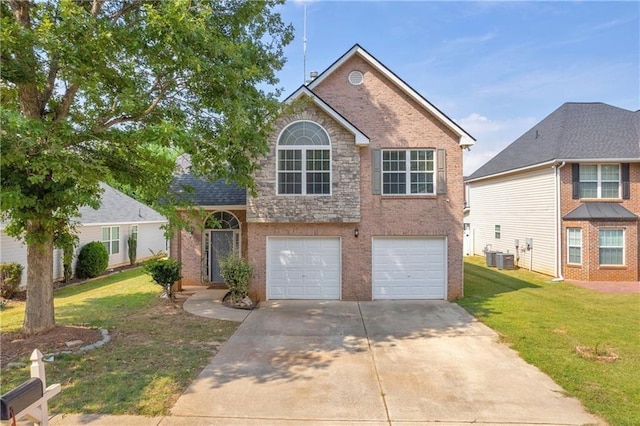 view of front of house with a front yard, a garage, and cooling unit