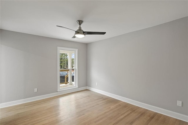 unfurnished room with ceiling fan and light hardwood / wood-style floors