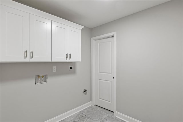 clothes washing area featuring hookup for a washing machine, light tile patterned floors, cabinets, and hookup for an electric dryer