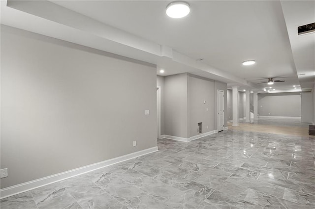 1320 Melbenan Dr, Atlanta, GA 30311 - below grade area with marble finish floor, baseboards, a ceiling fan, and recessed lighting
