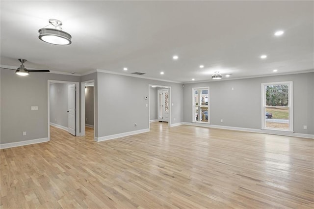 empty room with light hardwood / wood-style floors, ceiling fan, and ornamental molding