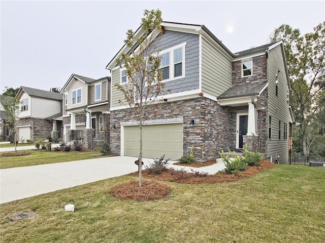 3305 Morgan Rd, Buford, GA 30519 - craftsman-style house with stone siding, an attached garage, concrete driveway, and a front yard