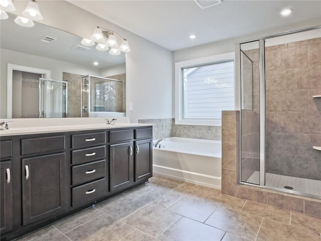 3305 Morgan Rd, Buford, GA 30519 - bathroom with a shower stall, double vanity, a bath, and tile patterned floors
