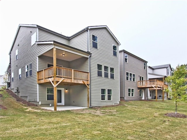 3305 Morgan Rd, Buford, GA 30519 - back of property featuring a lawn and a patio area
