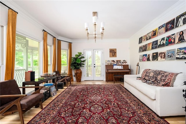 5102 Chastleton Dr, Stone Mountain, GA 30087 - living area with wood finished floors, french doors, and ornamental molding