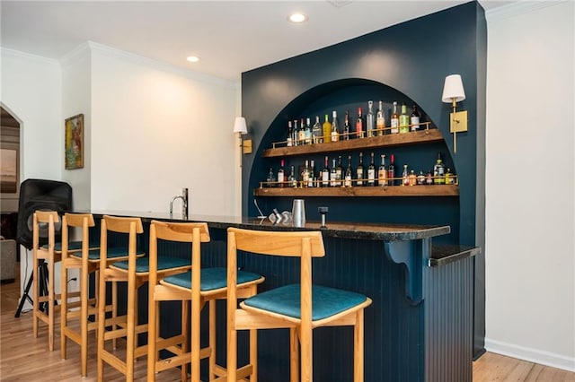 5102 Chastleton Dr, Stone Mountain, GA 30087 - indoor wet bar featuring wood finished floors, recessed lighting, and ornamental molding