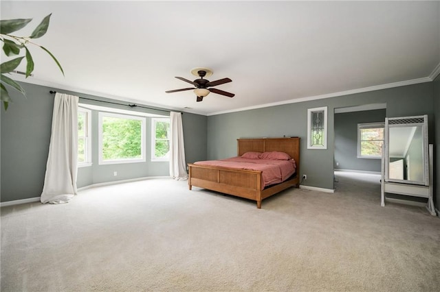 5102 Chastleton Dr, Stone Mountain, GA 30087 - bedroom featuring ornamental molding, baseboards, light carpet, and ceiling fan