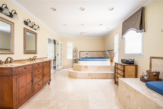 5102 Chastleton Dr, Stone Mountain, GA 30087 - full bathroom with french doors, a garden tub, ornamental molding, double vanity, and recessed lighting