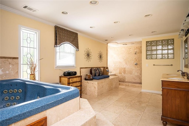 5102 Chastleton Dr, Stone Mountain, GA 30087 - bathroom with ornamental molding, a whirlpool tub, vanity, a walk in shower, and recessed lighting