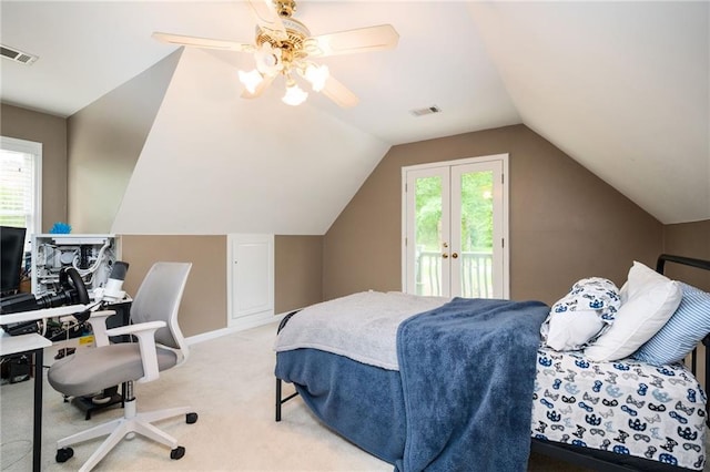5102 Chastleton Dr, Stone Mountain, GA 30087 - carpeted bedroom featuring multiple windows, access to outside, vaulted ceiling, and a ceiling fan