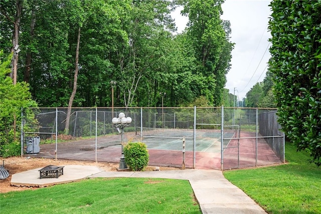 5102 Chastleton Dr, Stone Mountain, GA 30087 - view of tennis court with a fire pit