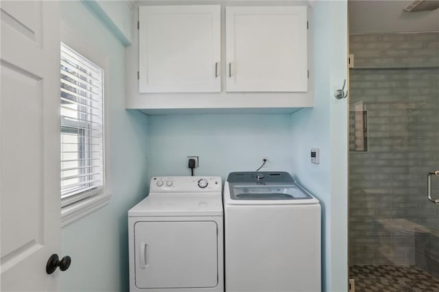 clothes washing area with washer and dryer