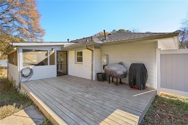 back of house with a wooden deck