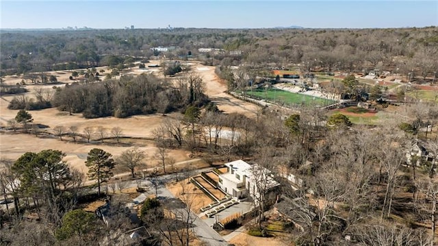 birds eye view of property with a rural view