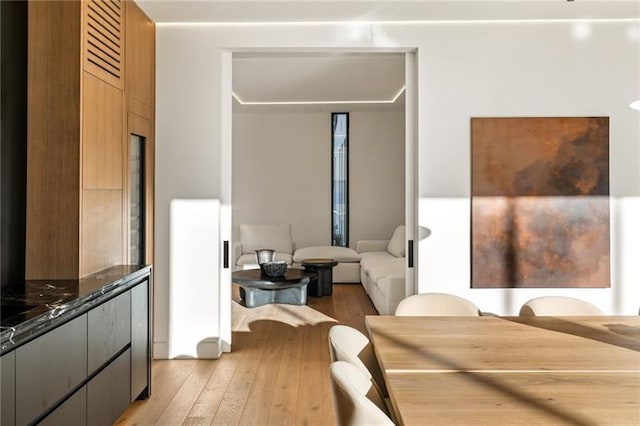 dining area with light wood-style flooring