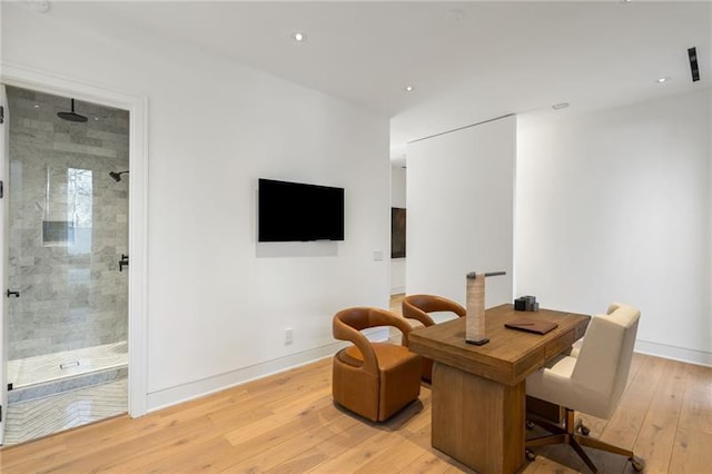 office area with recessed lighting, baseboards, and light wood-type flooring